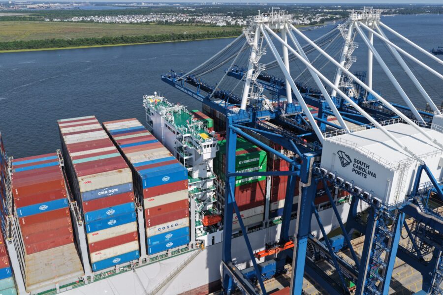 Aerial view of a container ship being unloaded by cranes at South Carolina Ports.