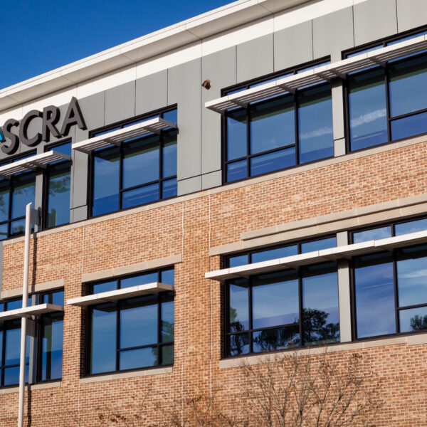 Exterior of the SCRA office building with brick and glass facade.