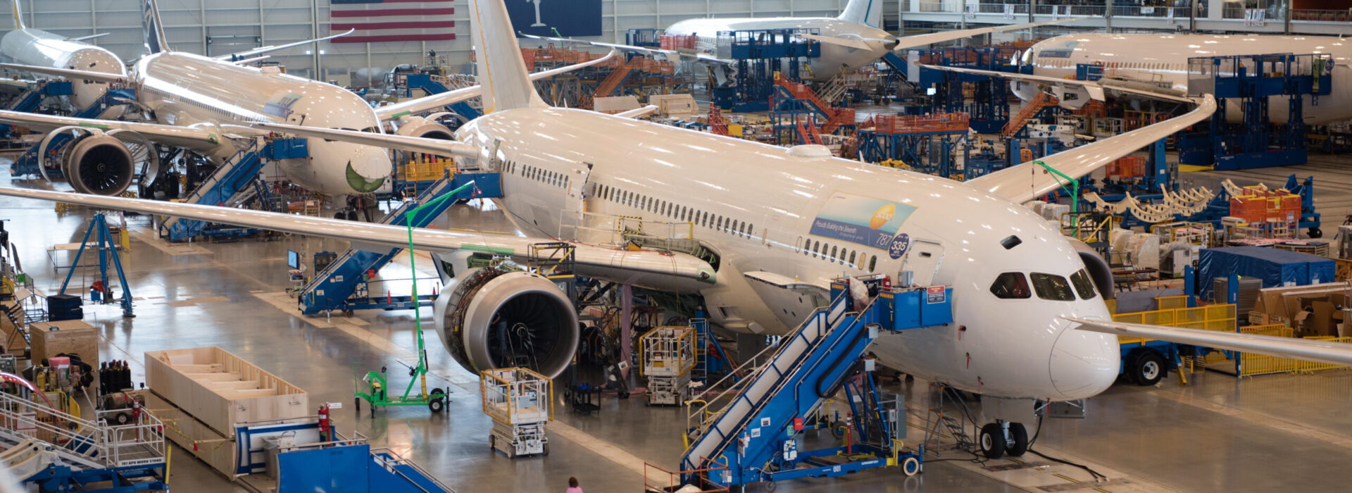 Four passenger airplanes sit in a hangar in the Charleston region.